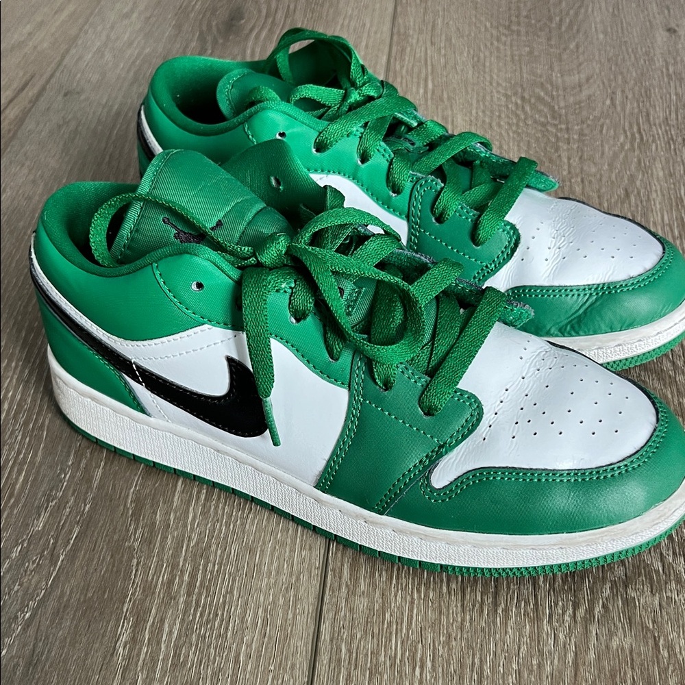 Jordan 1 Low in Pine Green with black Nike logo youth 7 or women’s size 8.5